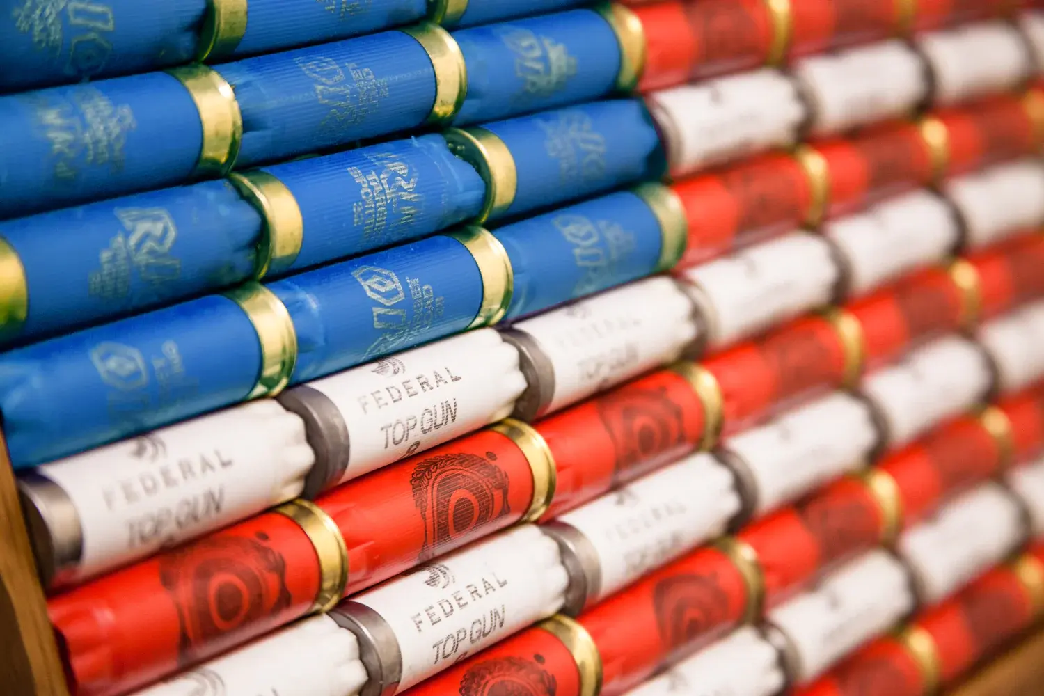 close up image of american flag made of shot gun shells